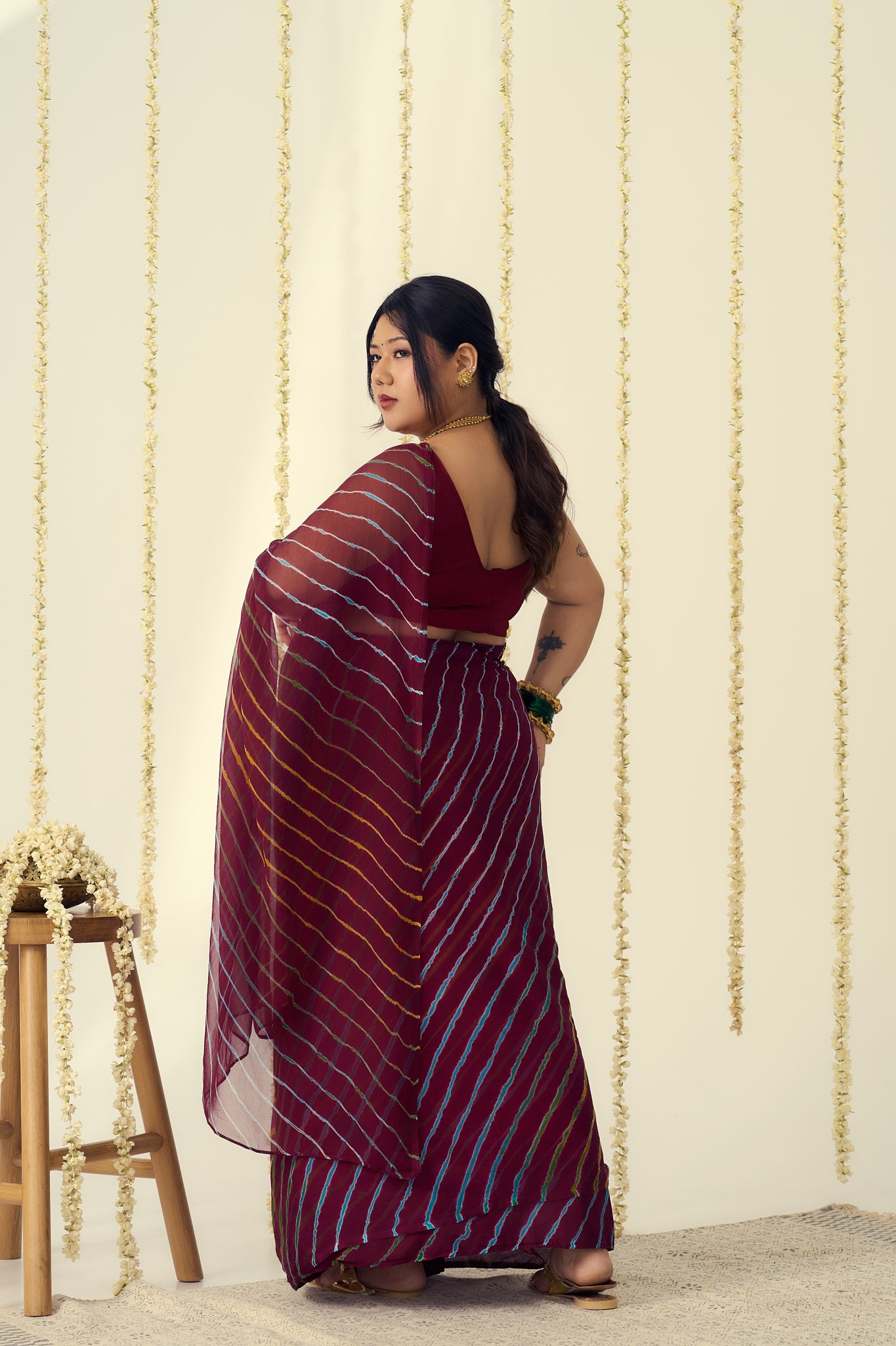 Maroon Leheriya Saree with Multi-colour Accents