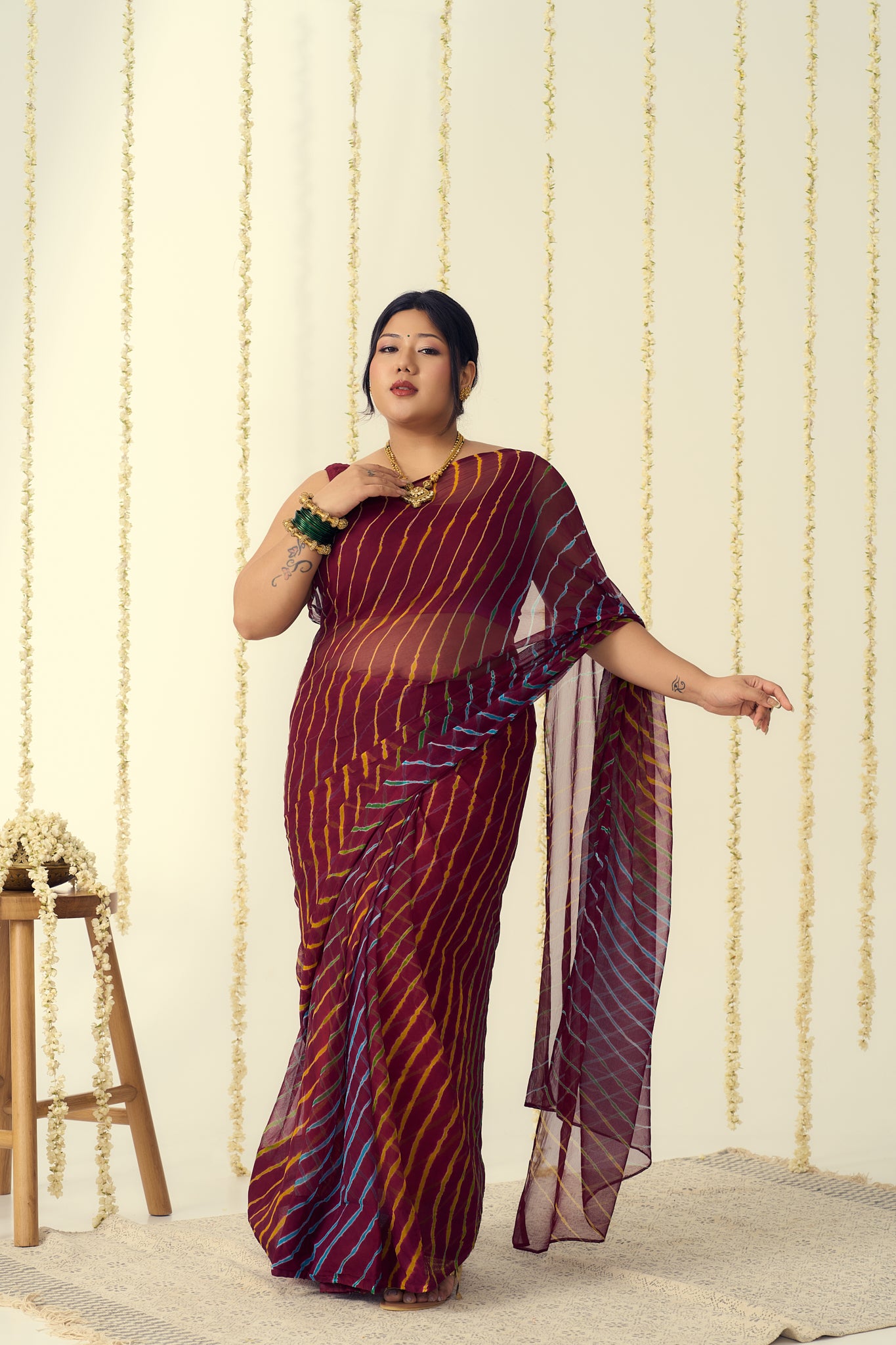 Maroon Leheriya Saree with Multi-colour Accents