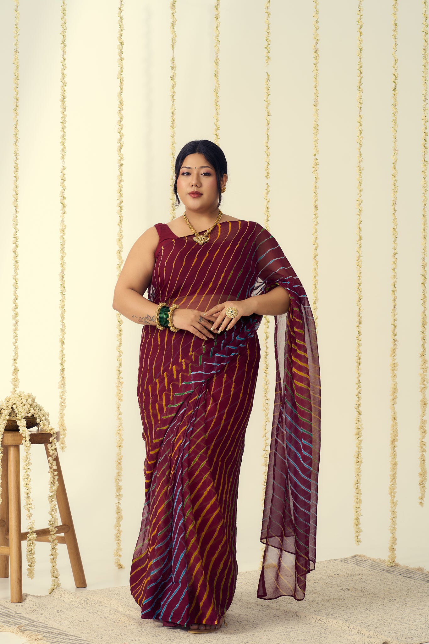 Maroon Leheriya Saree with Multi-colour Accents