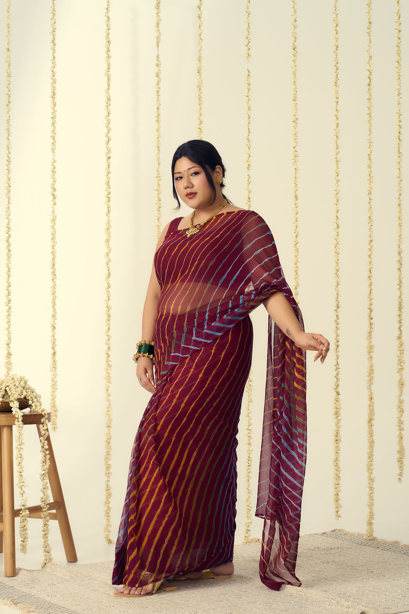 Maroon Leheriya Saree with Multi-colour Accents