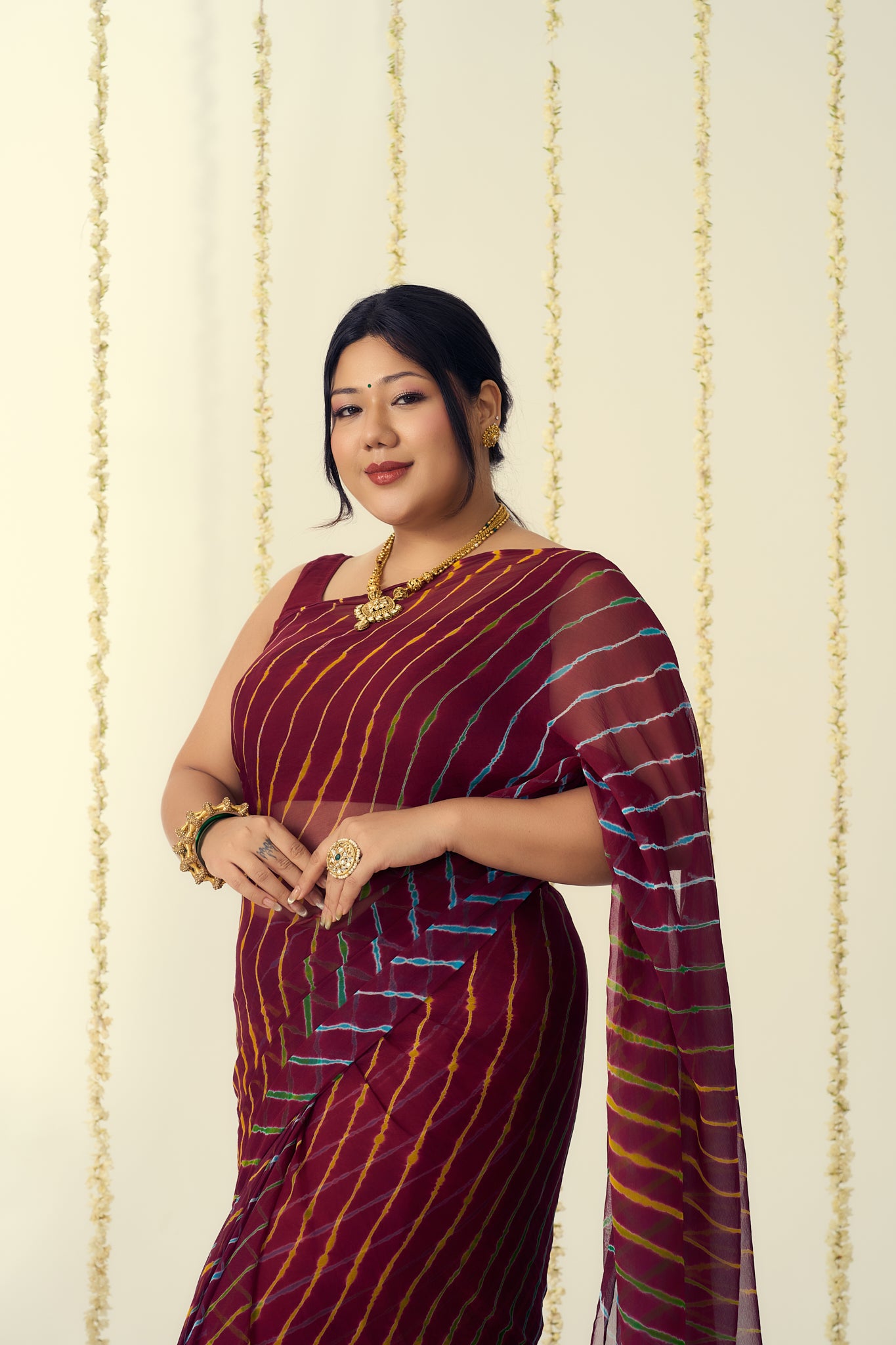 Maroon Leheriya Saree with Multi-colour Accents